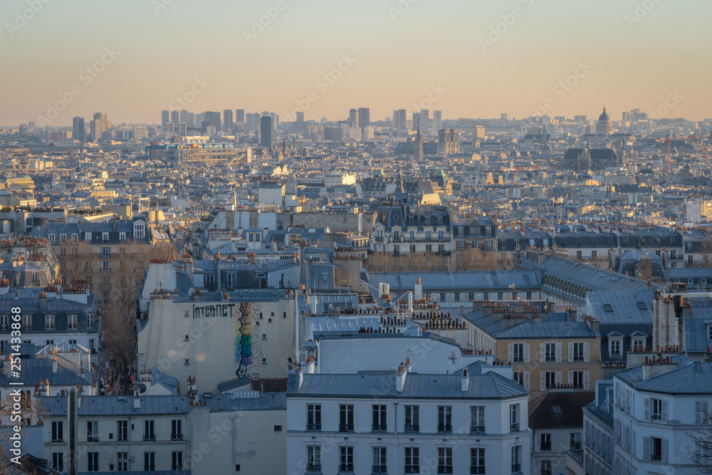 Paris, France - 02 24 2019: Montmartre at sunset. View from sacred heart