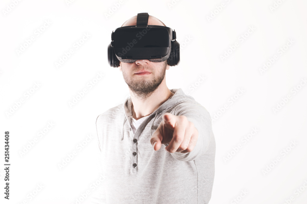 Man using virtual reality headset at white background Man using virtual reality headset at white background