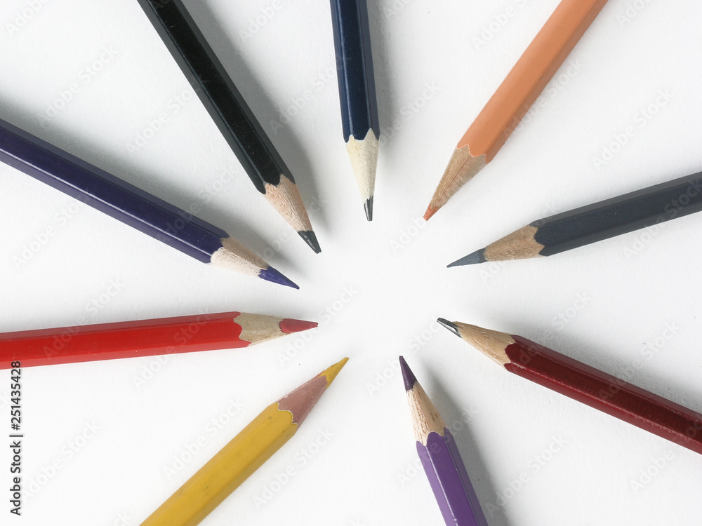 close up.colored pencils stacked in a circle on a white background close up.colored pencils stacked in a circle on a white background
