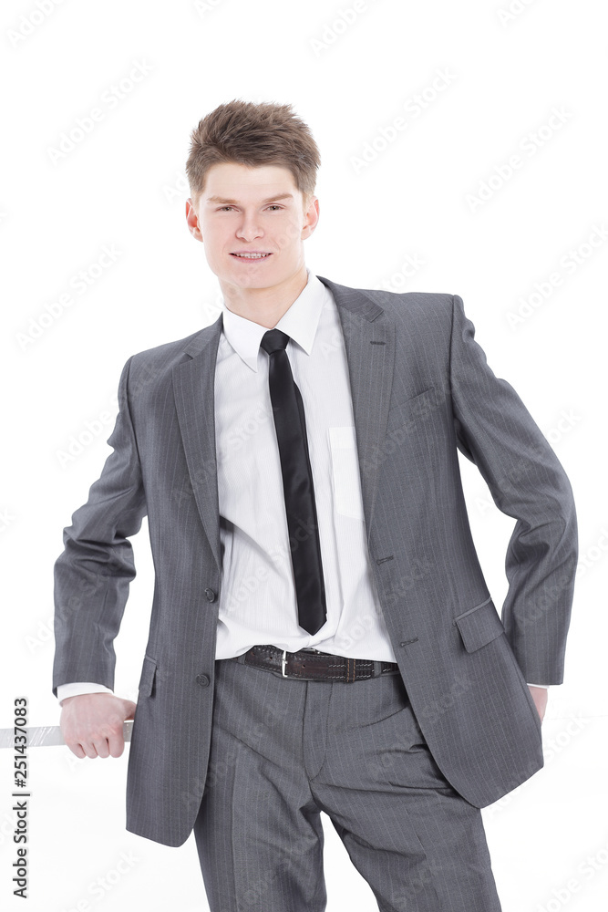 young businessman drawing on white wall.isolated on a white young businessman drawing on white wall.isolated on a white