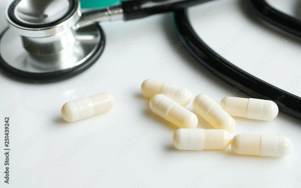 Medical marijuana capsules and stethoscope Medical marijuana capsules and stethoscope