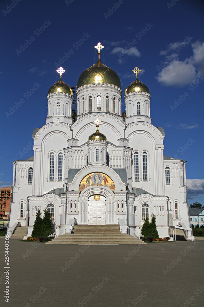 White Stone Orthodox temple with golden domes