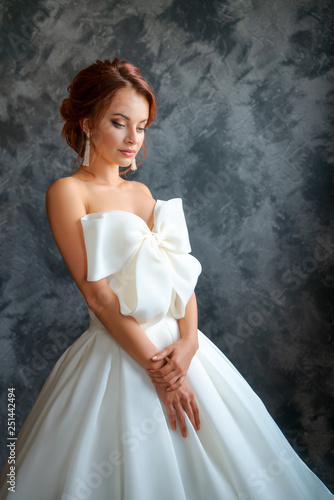 beautiful bride in wedding dress, beautiful make-up and styling