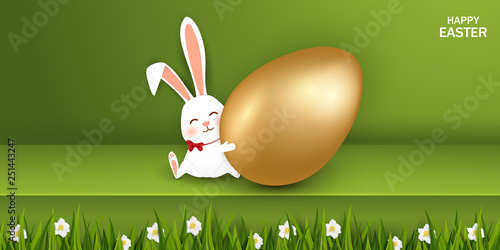 Happy Easter. Easter Rabbit Bunny with realistic gold egg, grass, flowers on green background. Cute, funny cartoon rabbit character with Paschal egg. Design template for Banner, flyer, card, poster.