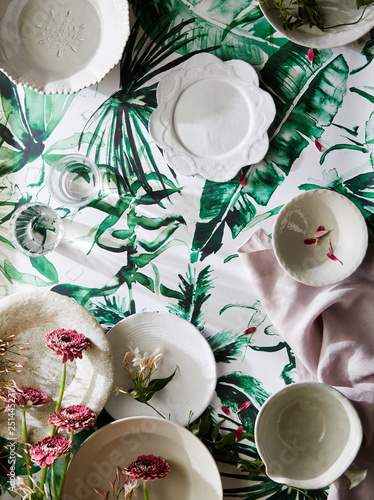 Plates on Floral Wallpaper with Petals