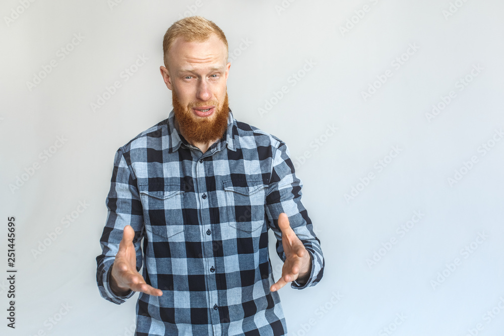 Freestyle. Mature man standing isolated on grey hands pointing at camera confused Freestyle. Mature man standing isolated on grey hands pointing at camera confused