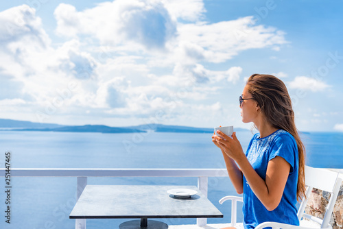 Photography Tranquil morning serene woman relaxing drinking breakfast coffee enjoying ocean sea view on luxury hotel balcony, summer travel holidays