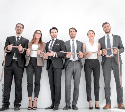 colleagues with wrists tied with a rope