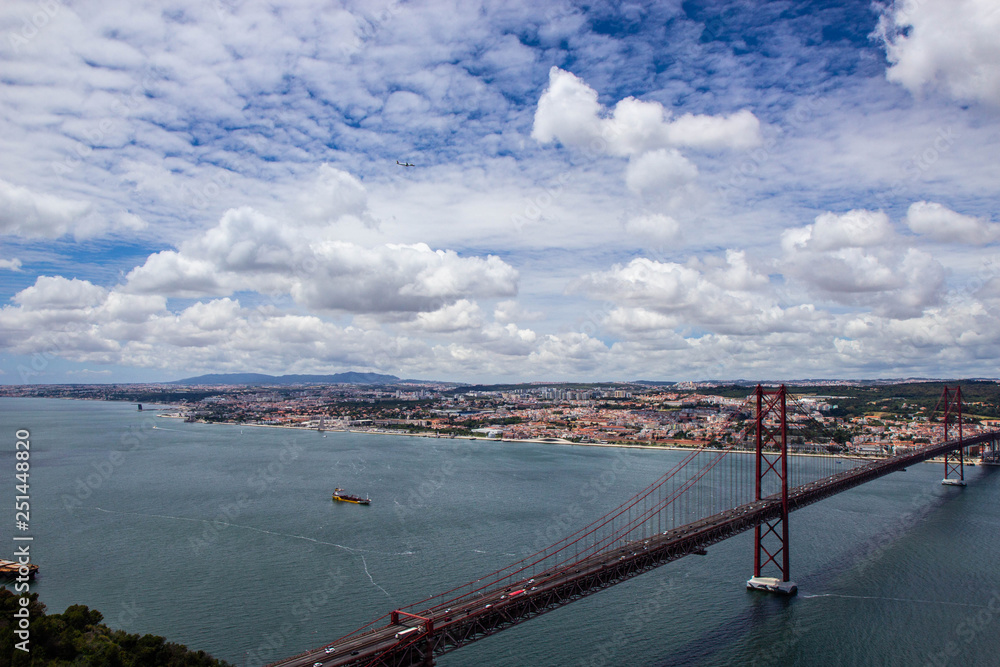 Panoramic view of Ponte 25 de Abril, long bridge in Lisbon