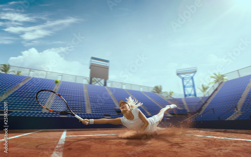 Tennis girl on a professional tennis court. © VIAR PRO studio