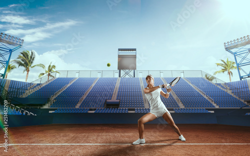 Tennis girl on a professional tennis court. © VIAR PRO studio