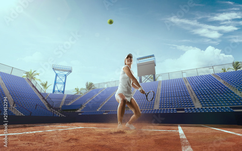 Tennis girl on a professional tennis court. © VIAR PRO studio