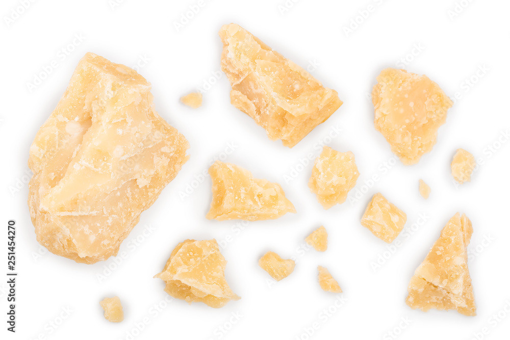 Parmesan cheese pieces isolated on white background. Closeup. Top view. Flat lay Parmesan cheese pieces isolated on white background. Closeup. Top view. Flat lay