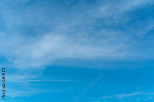 Wispy clouds on a blue sky