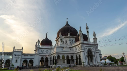 KUALA LUMPUR, MALAYSIA - 24th JAN 2019; 4K Time lapse of moving cloud over mosque Zahir in Kedah, Malaysia. photo