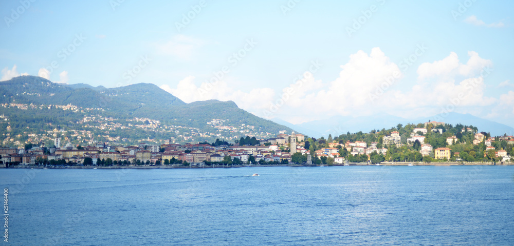 Panoramic summer view on the mundane and touristy city of Stresa and the mountains at Lago Maggiore in Piemonte, Italy