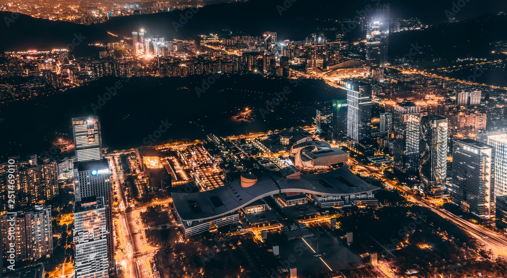 A bird's eye view of the urban architecture at night..