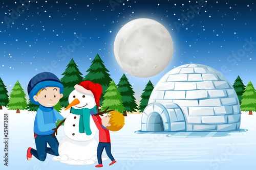 Father and son building snowman