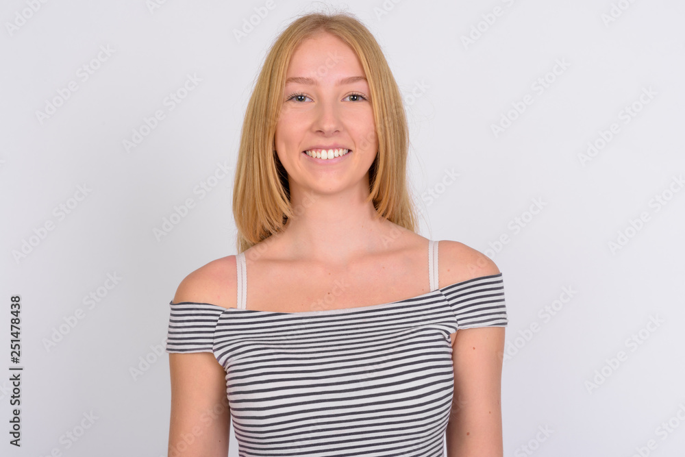 Face of happy young beautiful blonde teenage girl smiling Face of happy young beautiful blonde teenage girl smiling