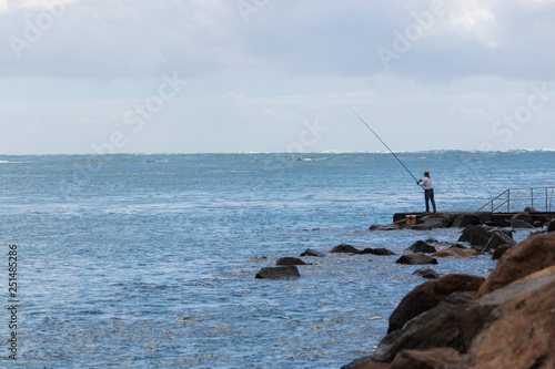 a men fishing in the sea Australia Gold Coast