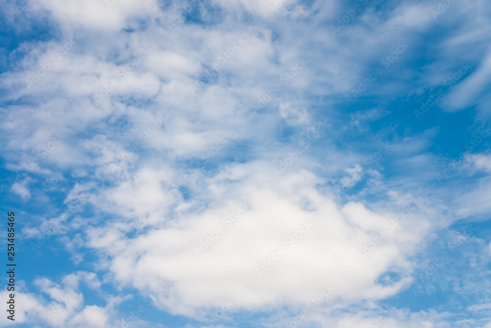 White clouds with blue sky background in sunny day. Green environmental and natural travel concept. White clouds with blue sky background in sunny day. Green environmental and natural travel concept.