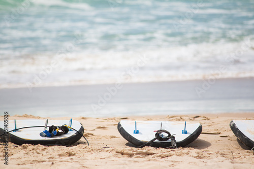 surfboard on the beach surf lesson class tropical beach 