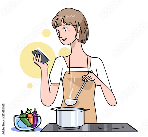 スマホを見ながら料理