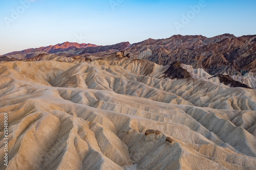 Dissected Hills and Alpenglow seen from Zebraskia Point in Death Valley National Park, California, USA. 
