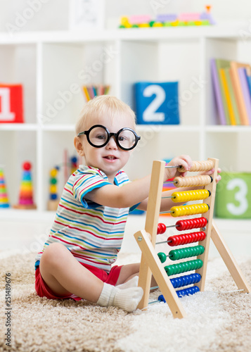 child toddler with eyeglass...