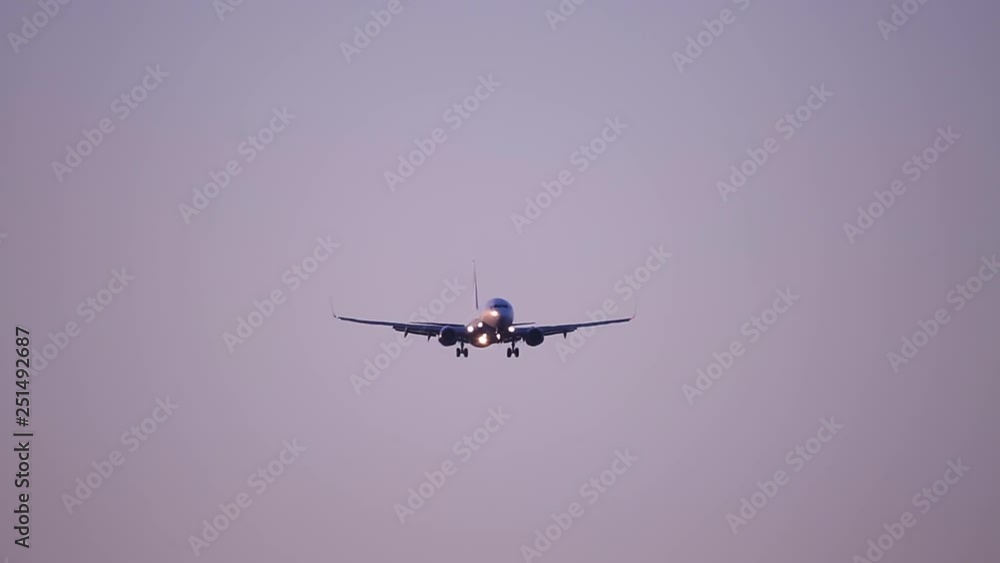 The plane is going down, preparing to land.