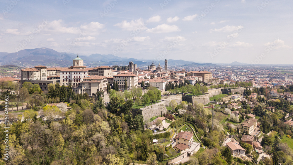 Bergamo, Italy. Drone aerial view of the old town. Landscape at the city center, its historical buildings and the Venetian walls a Unesco world heritage
