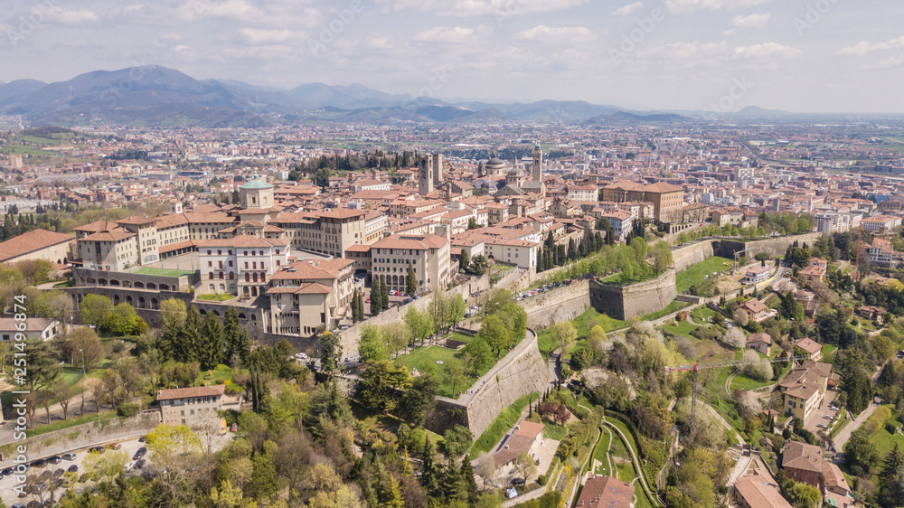 Bergamo, Italy. Drone aerial view of the old town. Landscape at the city center, its historical buildings and the Venetian walls a Unesco world heritage