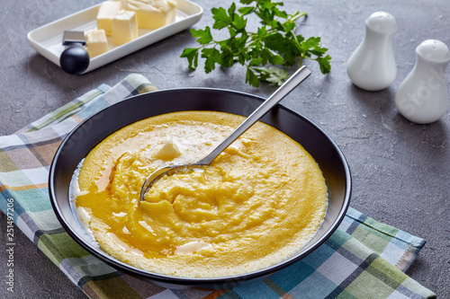 polenta with melting butter in a bowl