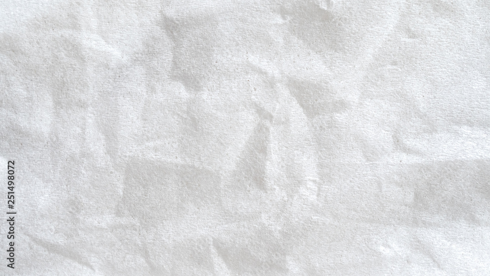 Fototapeta premium Close up white crumpled paper background.