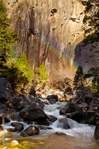 Rainbow over a creek in Yosemite