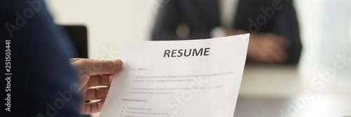 Fotografía Boss holding resume cv paper interviewing vacancy candidature panoramic image