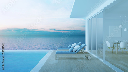 Interior of a villa with a swimming pool. House overlooking the sea. Night. Evening lighting. 3D rendering. © artemp1