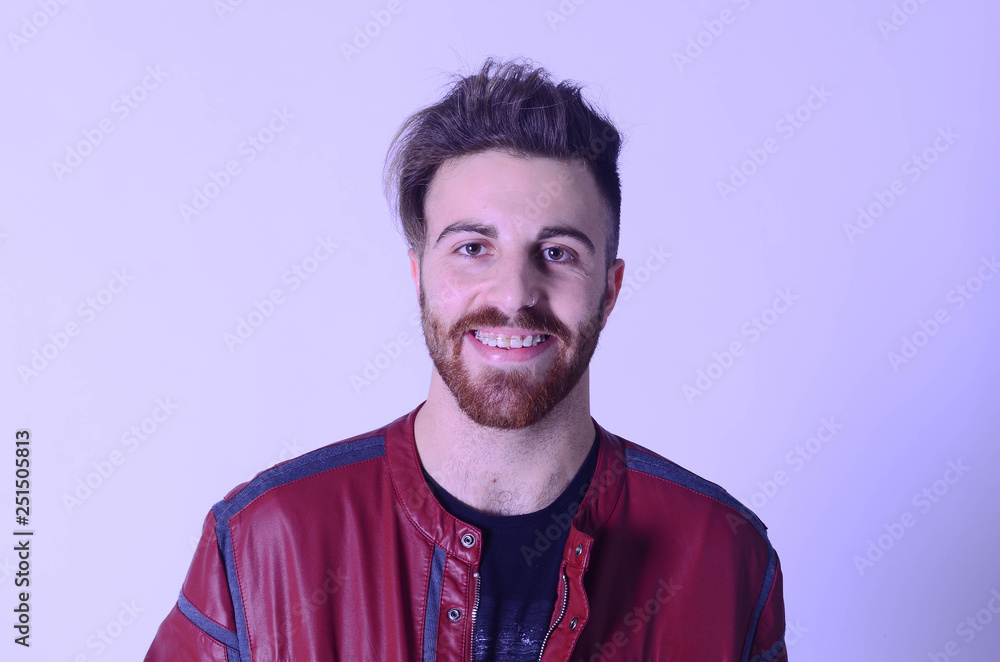 Fototapeta premium Portrait of young man with brackets on isolated white background