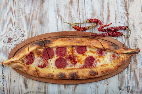 Traditional Turkish Pita (Turk Pidesi); Sucuk Pide. photo