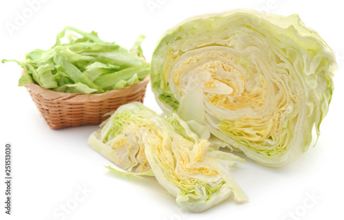 Fresh sliced Iceberg lettuce in a basket © Swapan