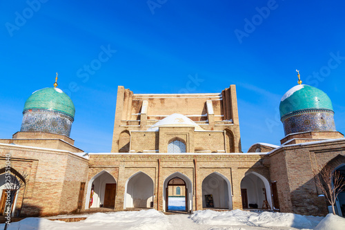 Snow and blue domes and minarets of Hazrati Imam complex, religious center of Tashkent, Uzbekistan