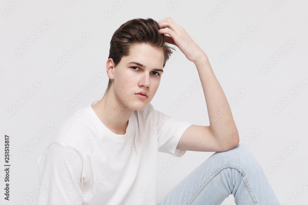 Young Male Model wearing white t-shirt Young Male Model wearing white t-shirt