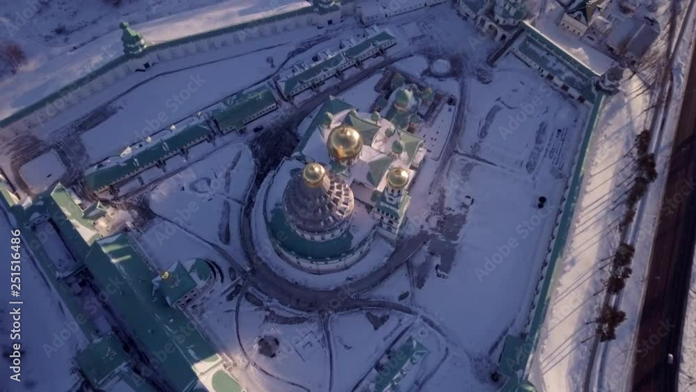 View from the height of the male Orthodox monastery in the early morning of a frosty winter. European part of Russia View from the height of the male Orthodox monastery in the early morning of a frosty winter. European part of Russia