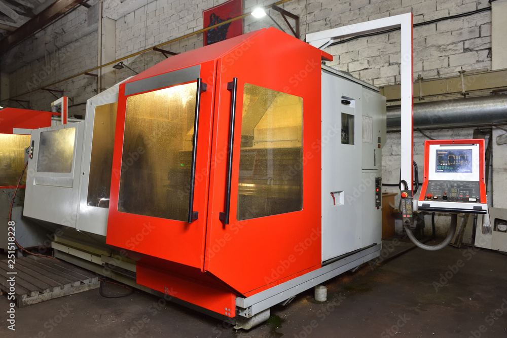 CNC machine for working with metal, slightly dirty, is in the factory. Cnc machine red CNC machine for working with metal, slightly dirty, is in the factory. Cnc machine red