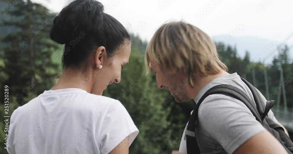 Beautiful couple kisses in the mountains. Beautiful couple kisses in the mountains.
