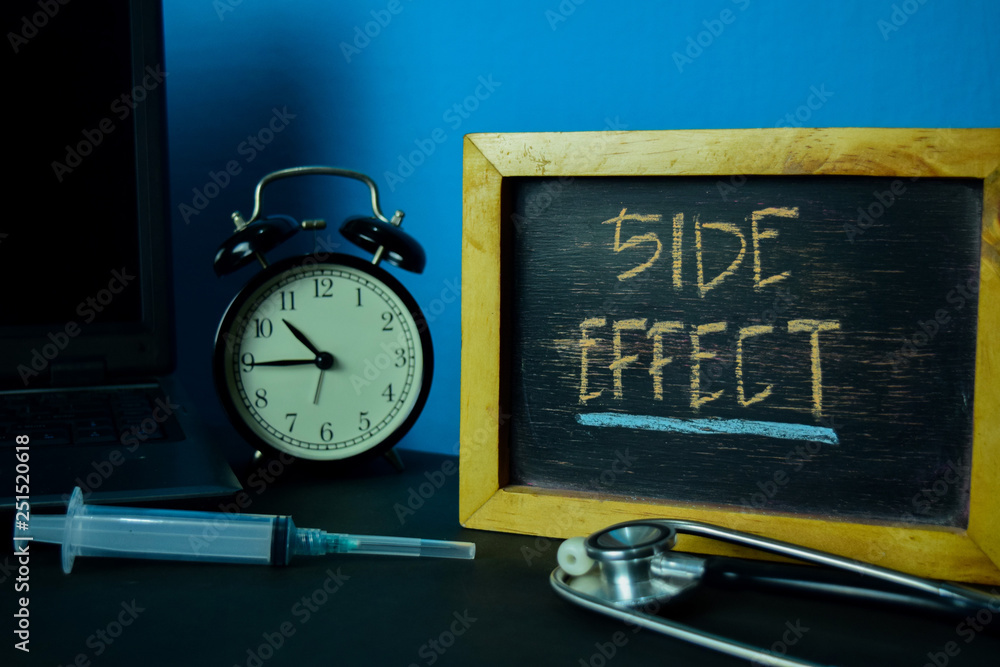 Side Effect Planning on Background of Working Table with Office Supplies. Medical and Healthcare Concept Planning on Blue Background Side Effect Planning on Background of Working Table with Office Supplies. Medical and Healthcare Concept Planning on Blue Background