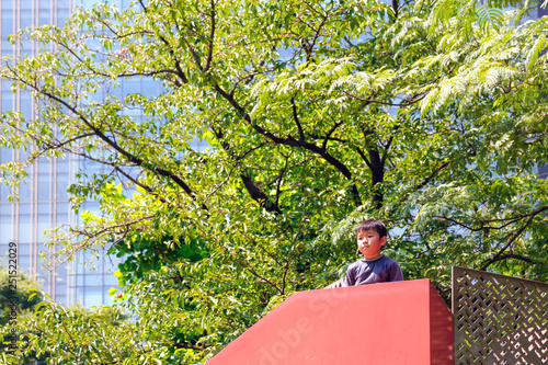 A boy playing in the park