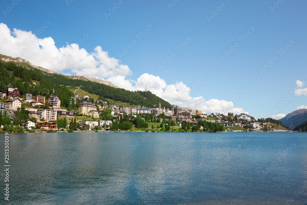 Sankt Moritz town and lake in summer, sunlight in Switzerland