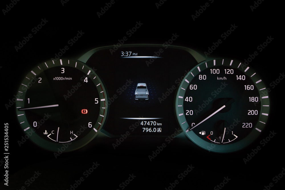 Speedometer dashboard of pickup truck.