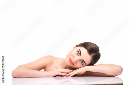 Face of attractive young and healthy woman with nude makeup. Health care, spa, makeup, face lifting concept.
